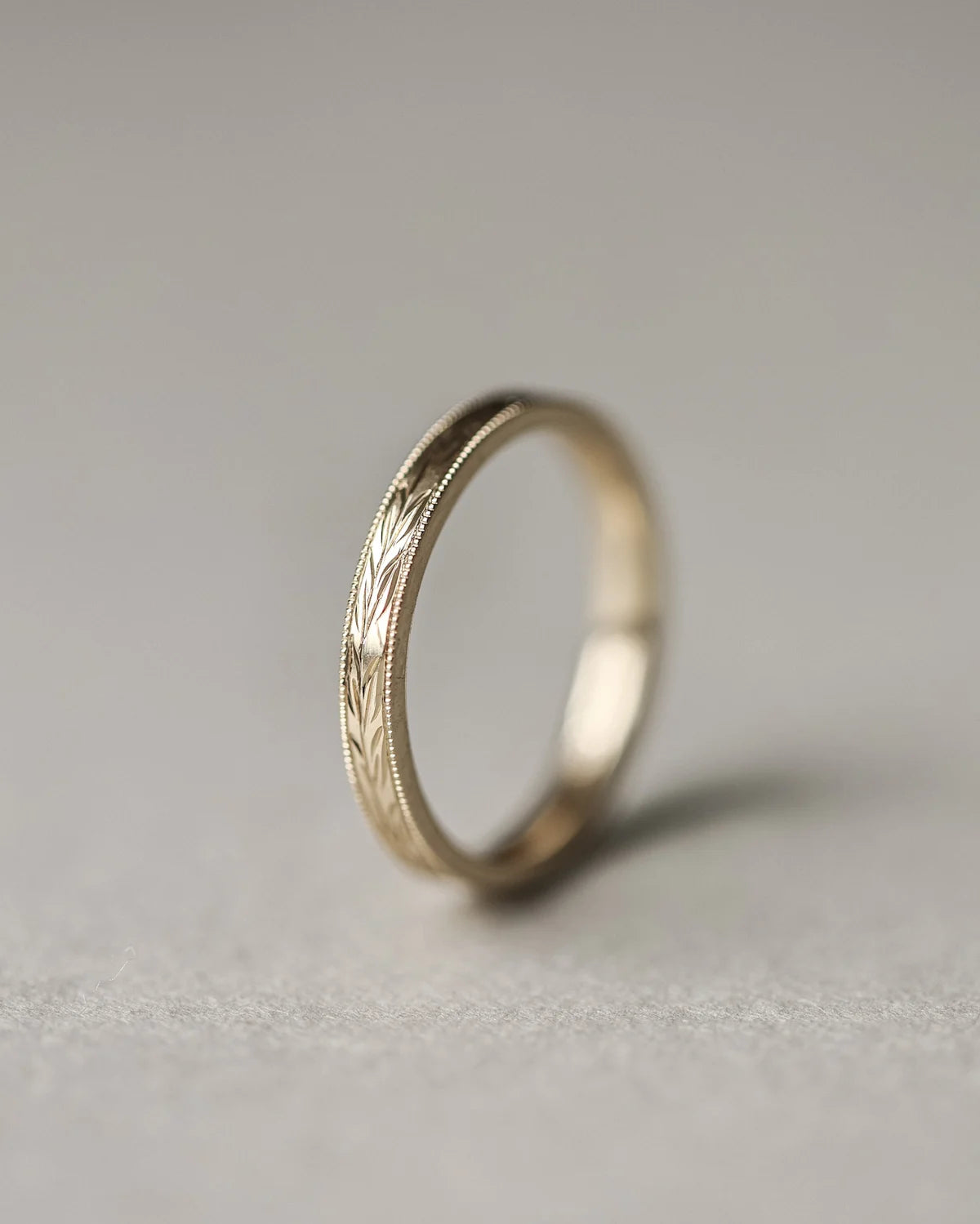 gold band side view olive leaf carving detail