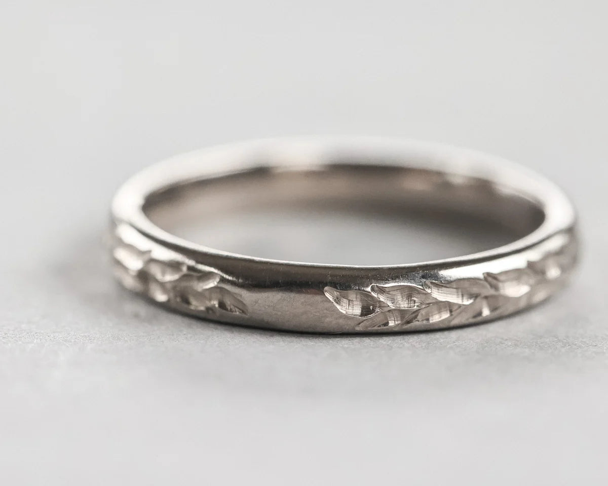 Front view of 3mm white gold wedding band with Barleycorn engraving