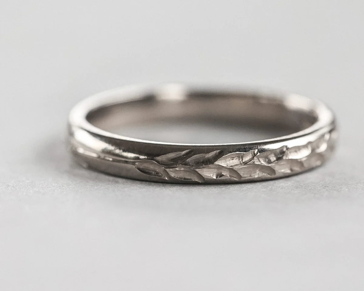 Close-up of Barleycorn motif on 18ct white gold band