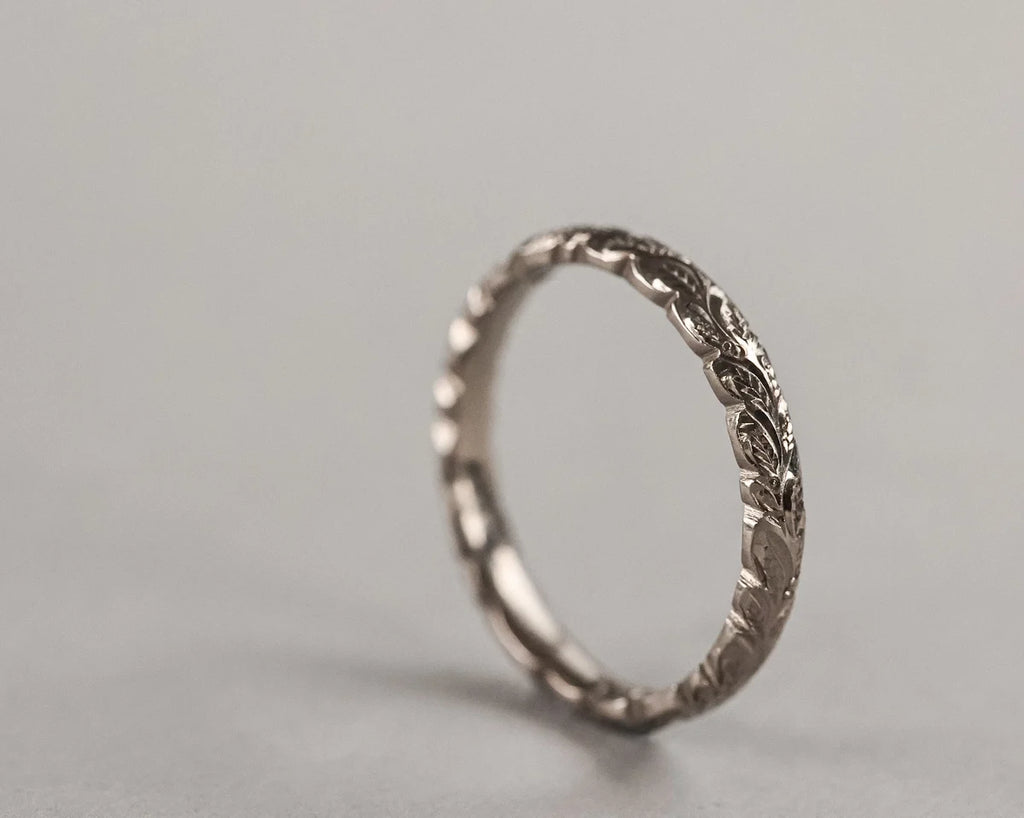 side view 3mm white gold band carved laurel detail