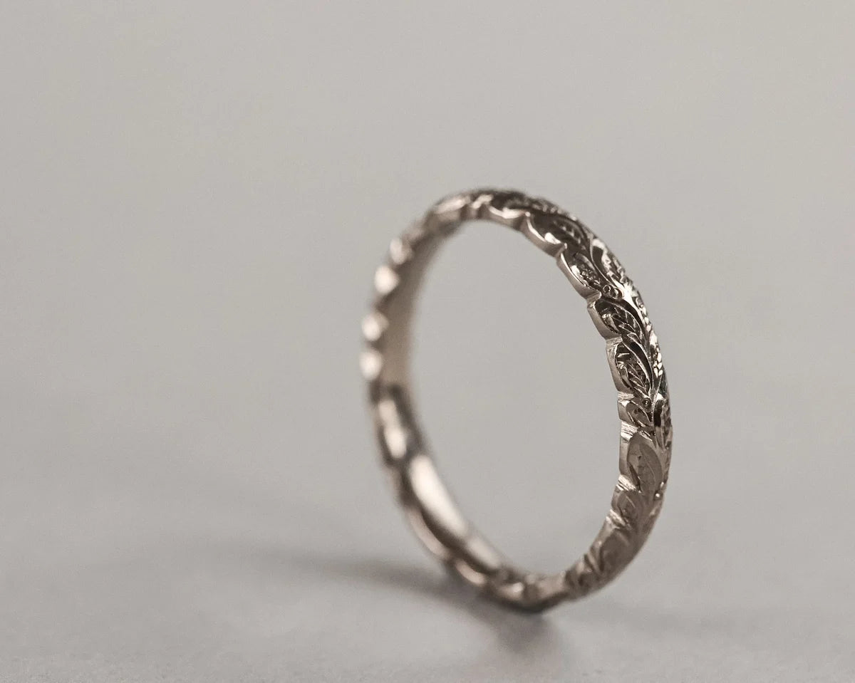 side view 3mm white gold band carved laurel detail
