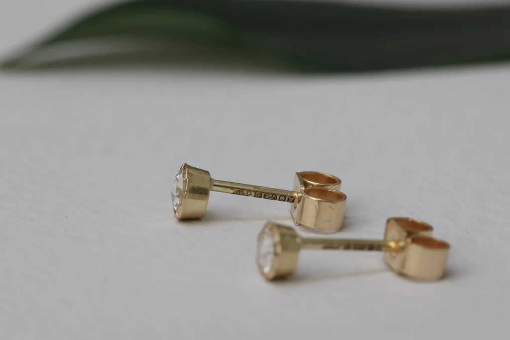 butterfly back diamond stud earrings gold side view