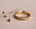 hand carved oak leaf detail gold ring textured surface