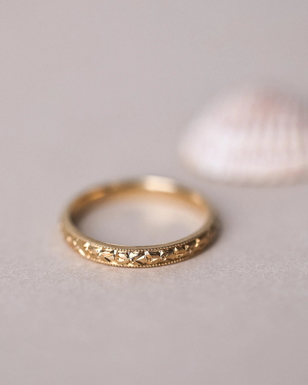 milled edge detail gold wedding ring 2.5mm band