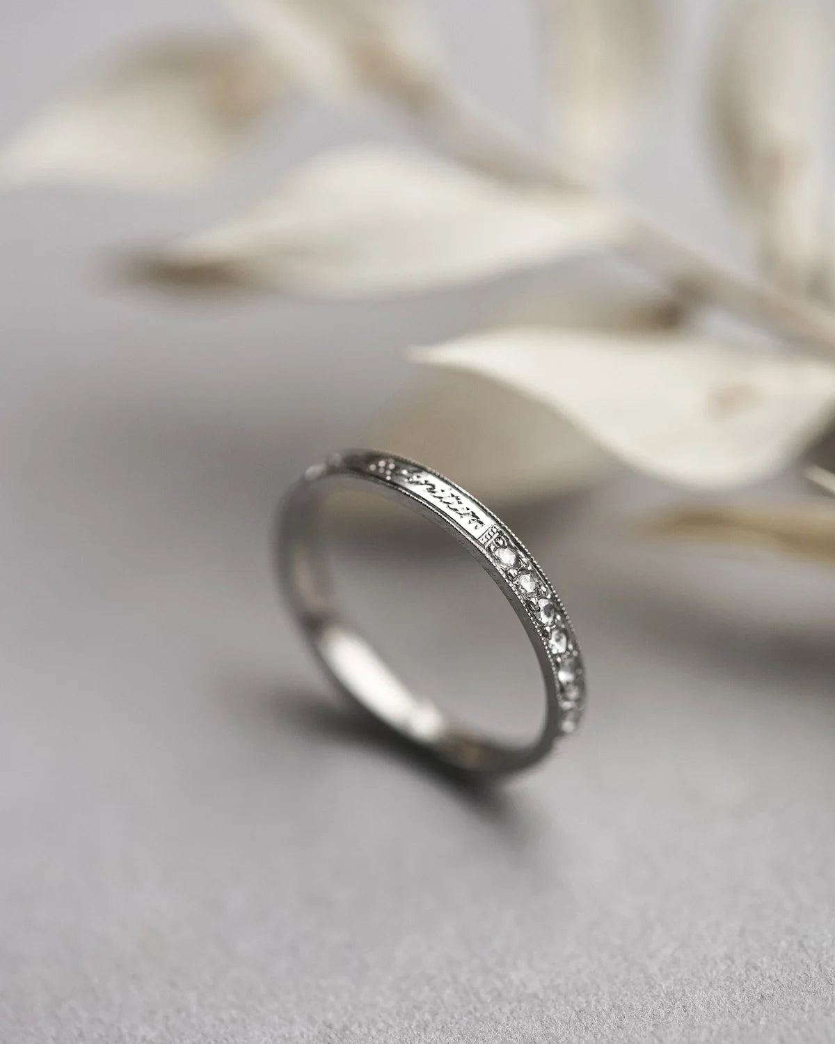 pave rose cut diamonds detail eternity ring platinum milled edge