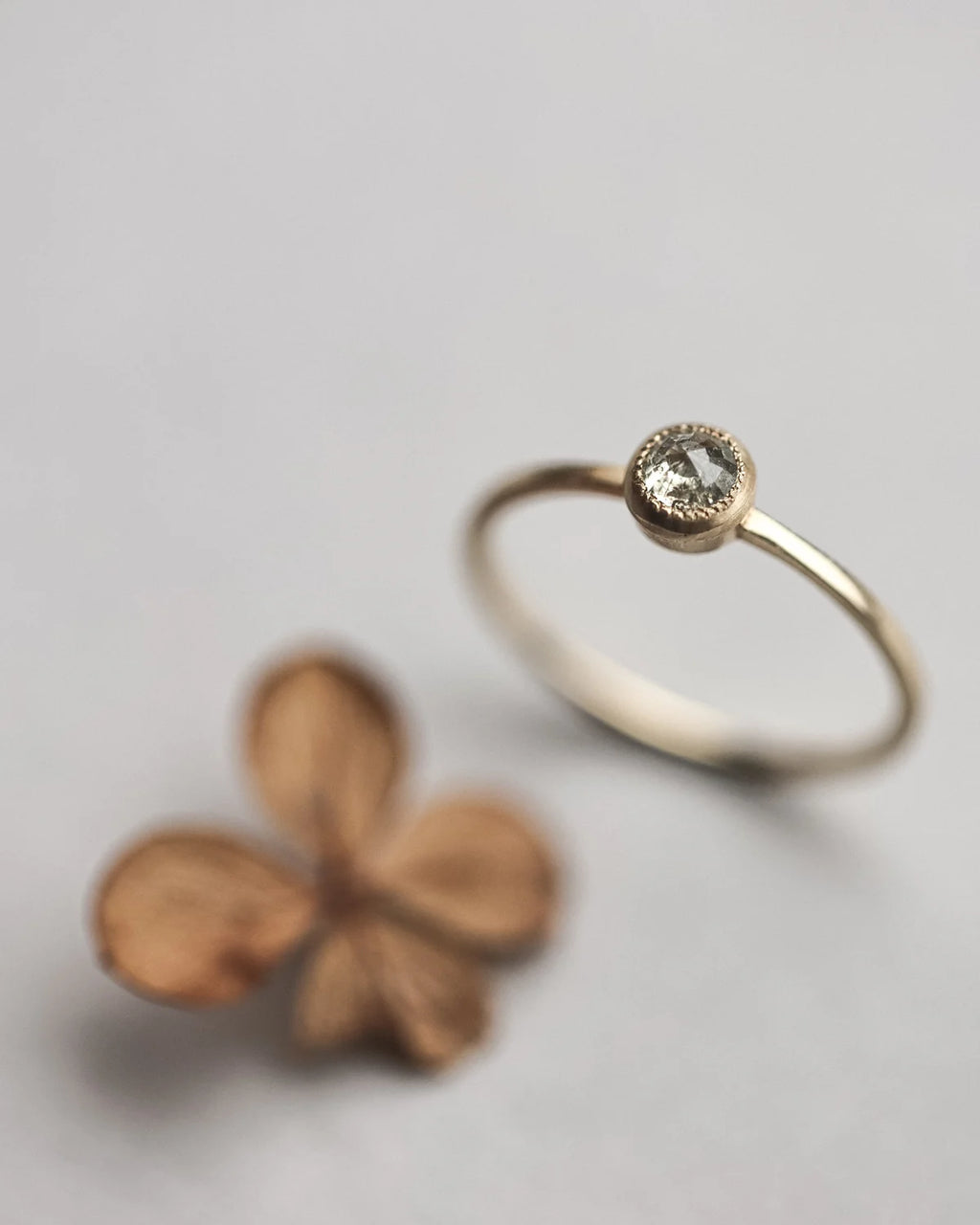 Soft focus yellow-grey rose-cut diamond ring in 18ct yellow gold