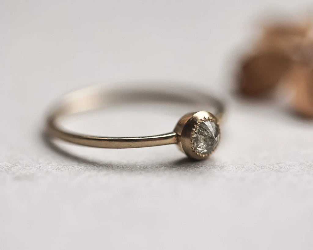 Side view of 18ct yellow gold ring with yellow-grey rose-cut diamond