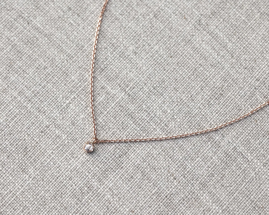 rose gold chain and diamond pendant