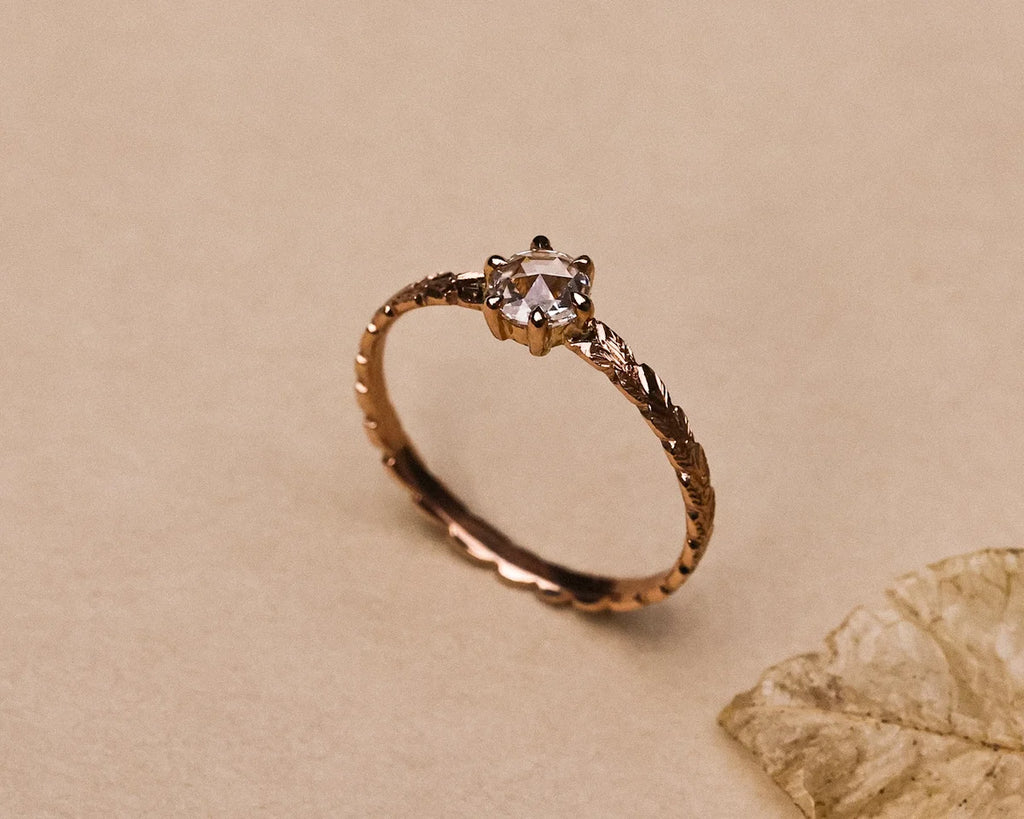 Rose-cut diamond and carved rose gold band