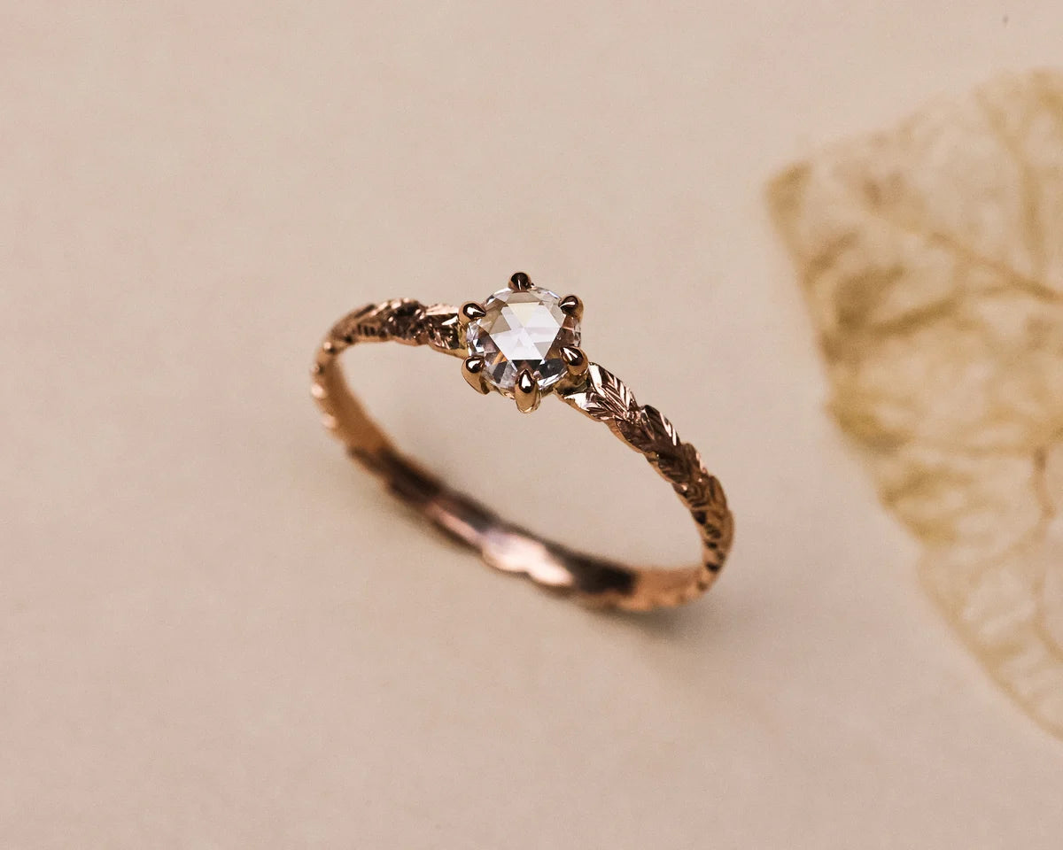 18ct rose gold botanical engagement ring