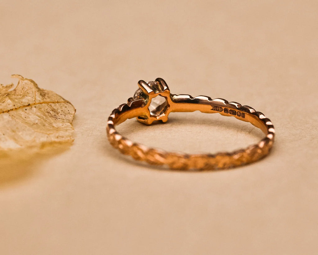 Rose-cut diamond ring with botanical leaf engraving