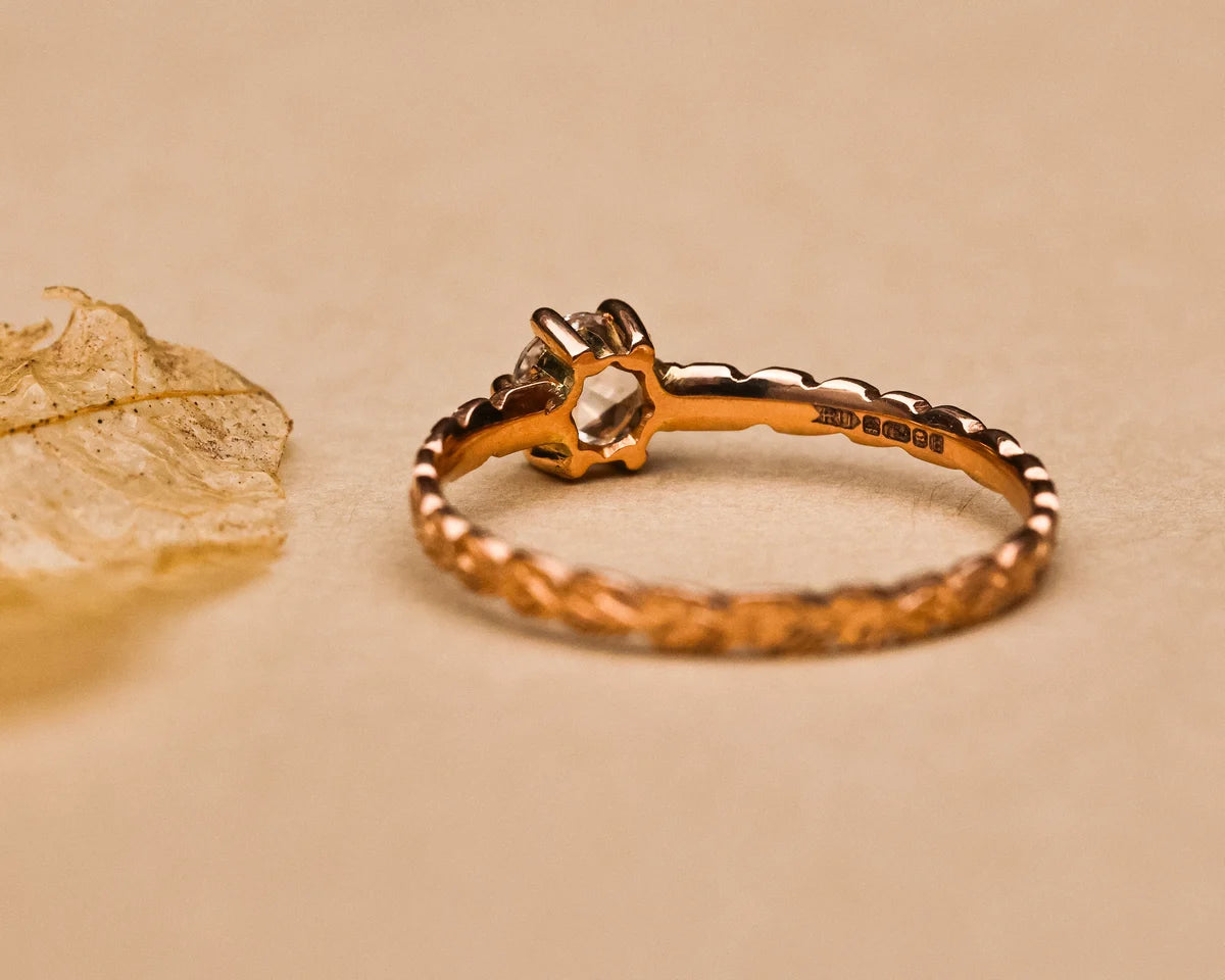 Rose-cut diamond ring with botanical leaf engraving