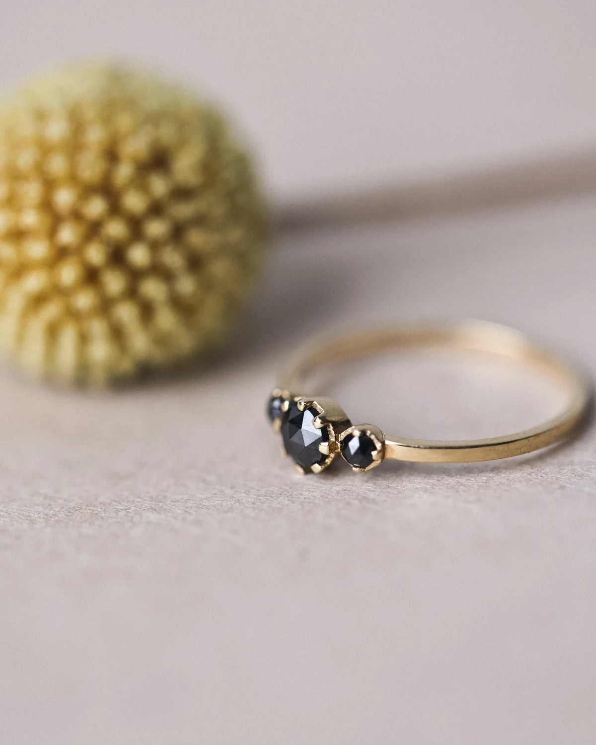 black diamond trilogy ring side stones detail 18ct gold