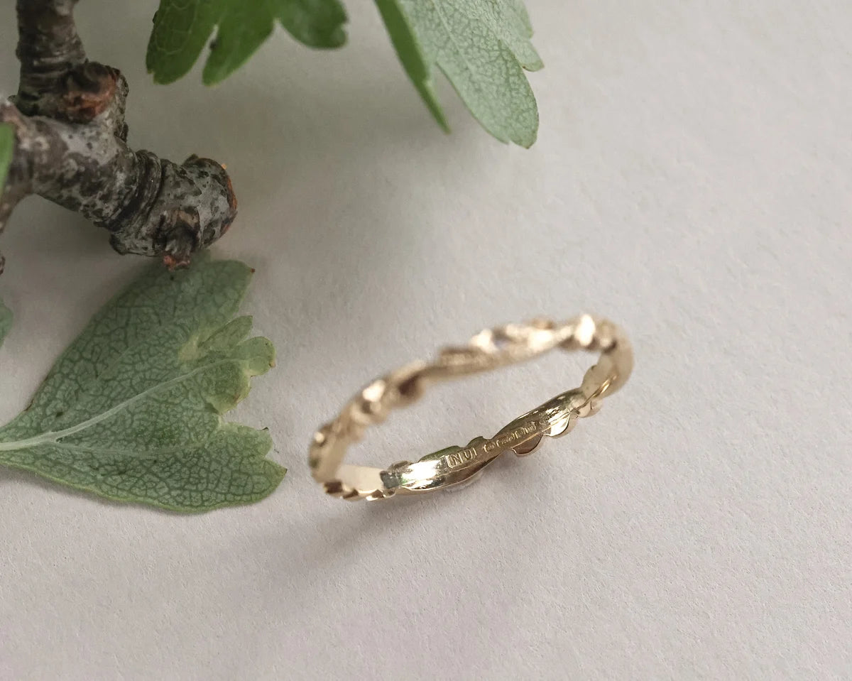 engraved floral pattern detail gold band ring