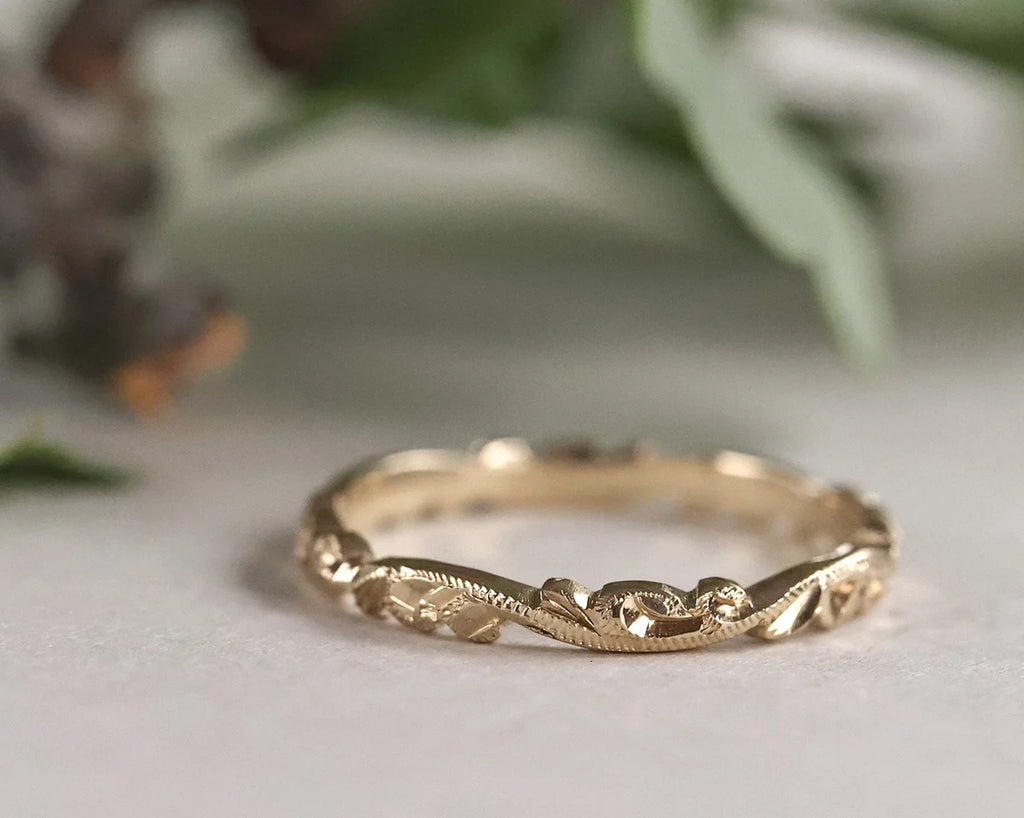 engraved floral pattern detail gold band ring