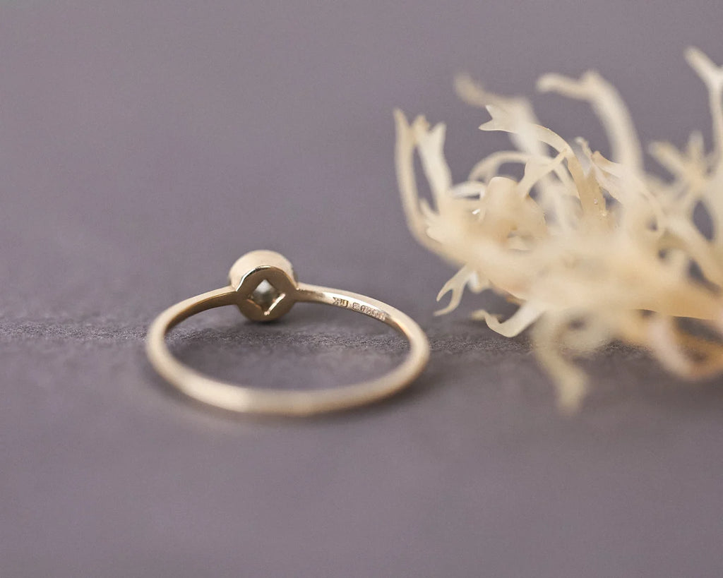Back view of handmade yellow gold rose-cut diamond ring