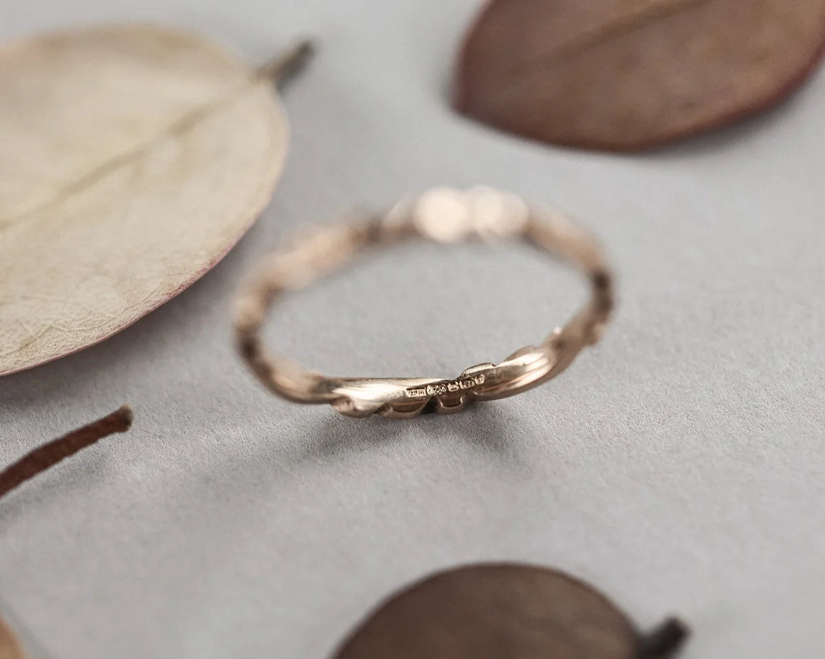 fine 2mm rose gold band carved floral ring side view