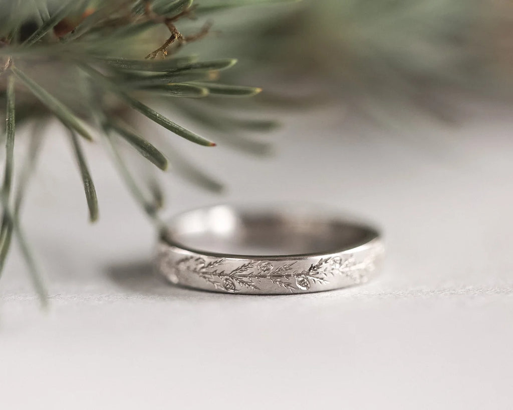 fir tree pattern engraved detail platinum ring