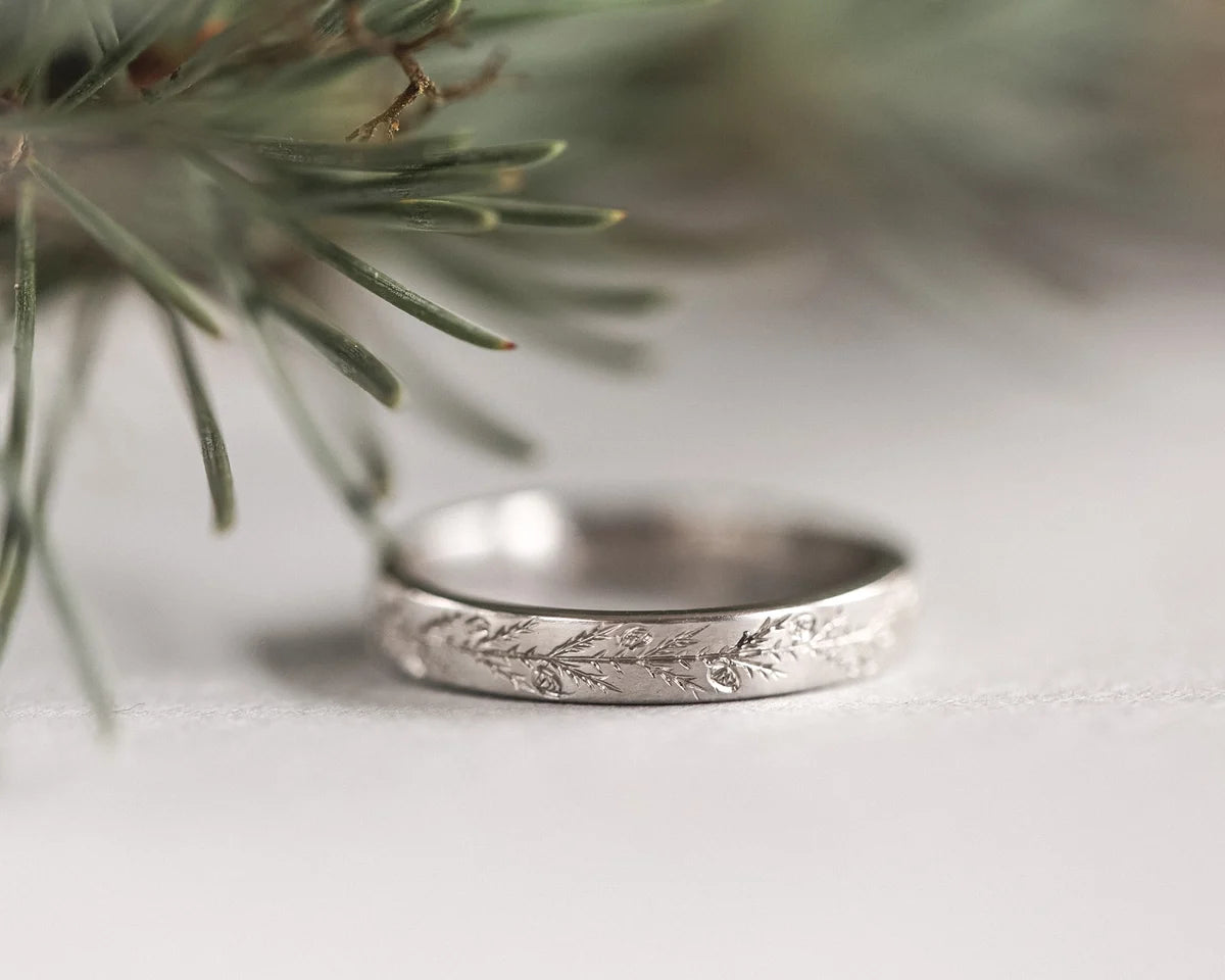 fir tree pattern engraved detail platinum ring