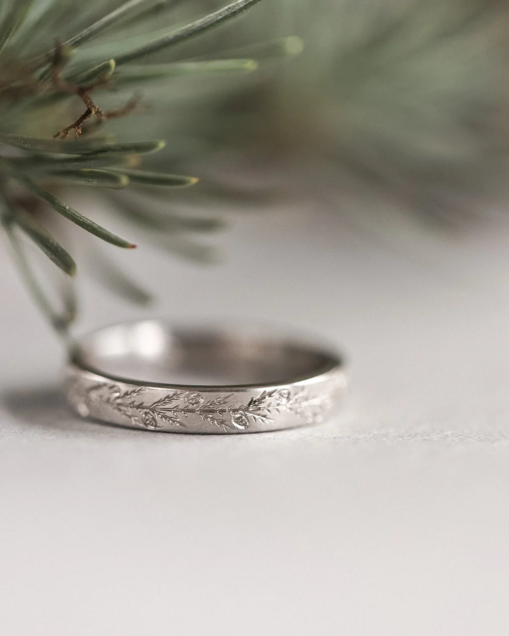 fir tree pattern engraved detail platinum ring