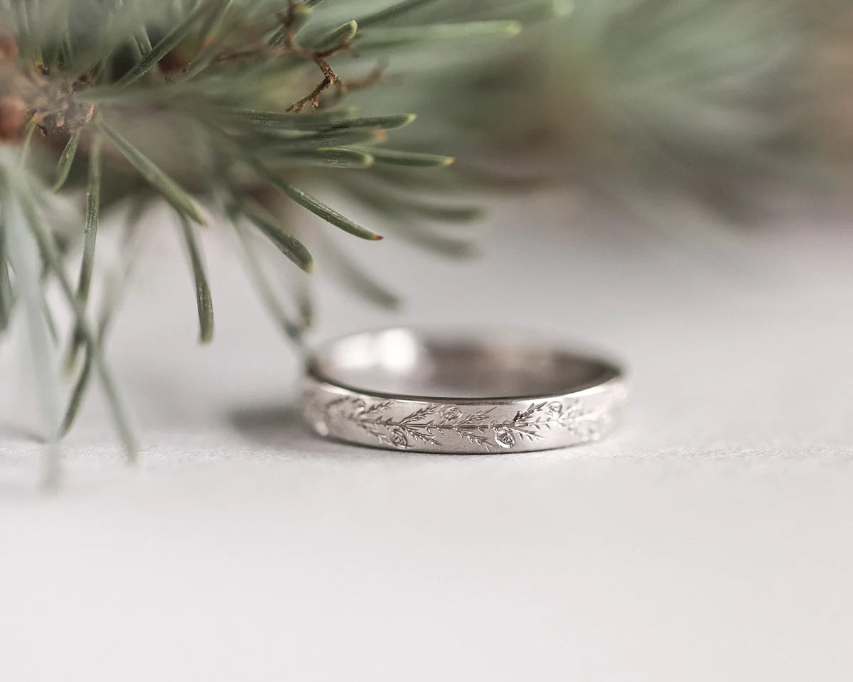 fir tree pattern engraved detail platinum ring