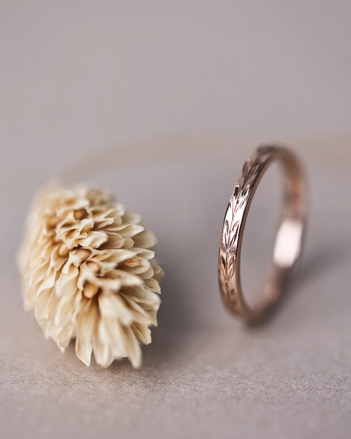 Side view of handmade olive leaf ring in 18ct rose gold