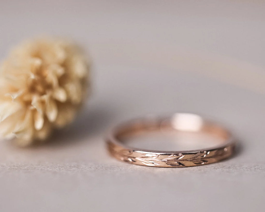 Low front view of 2mm rose gold olive leaf wedding band