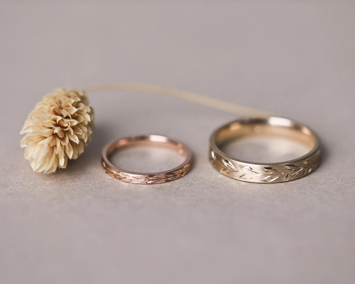 9ct yellow gold olive leaf ring paired with plain wedding band