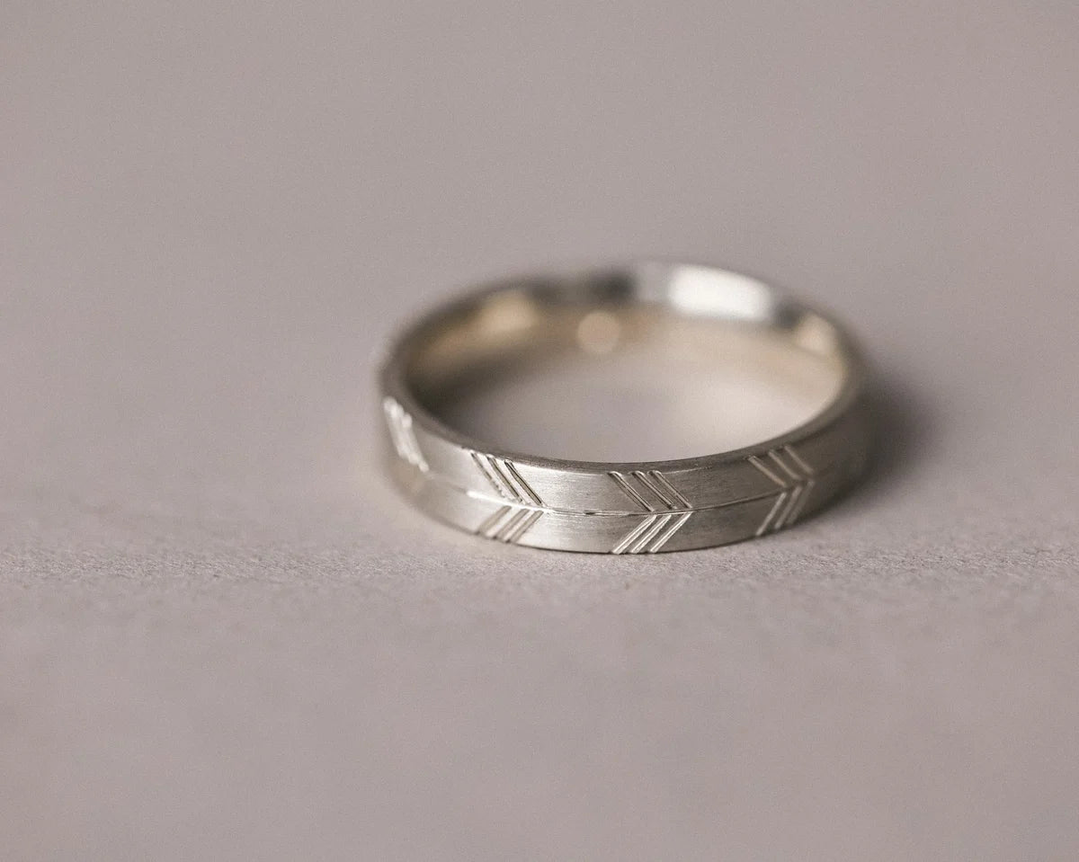 bold white gold wedding ring 4mm engraved arrow motif