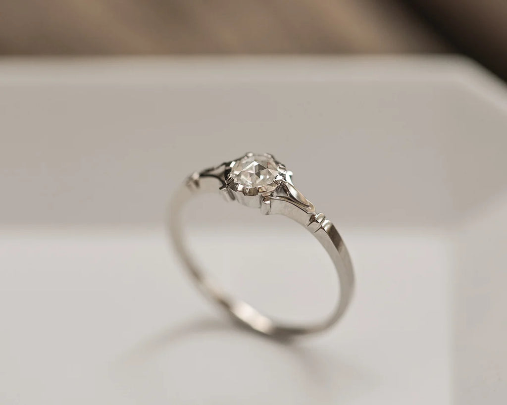 fine diamond detail rose cut platinum ring close view