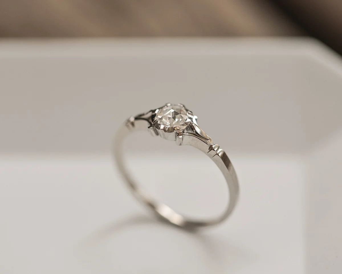 fine diamond detail rose cut platinum ring close view