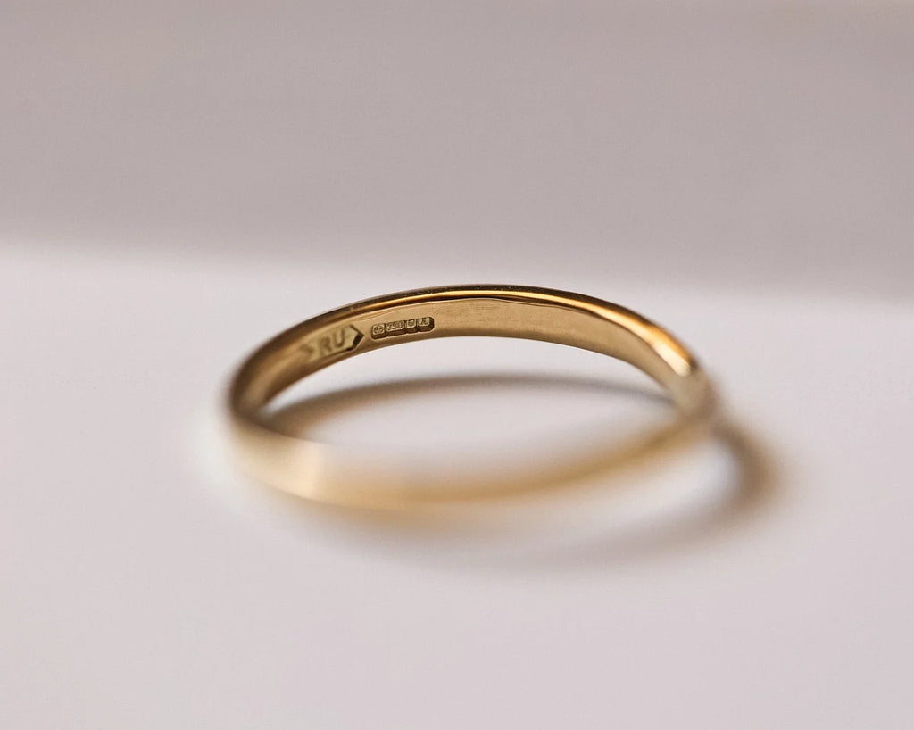 Back view of 18ct yellow gold wishbone ring with smooth interior