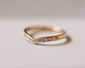 White diamond wishbone semi-eternity ring in 18ct yellow gold