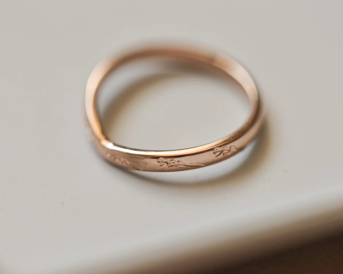 Front view of 18ct rose gold barleycorn wishbone ring