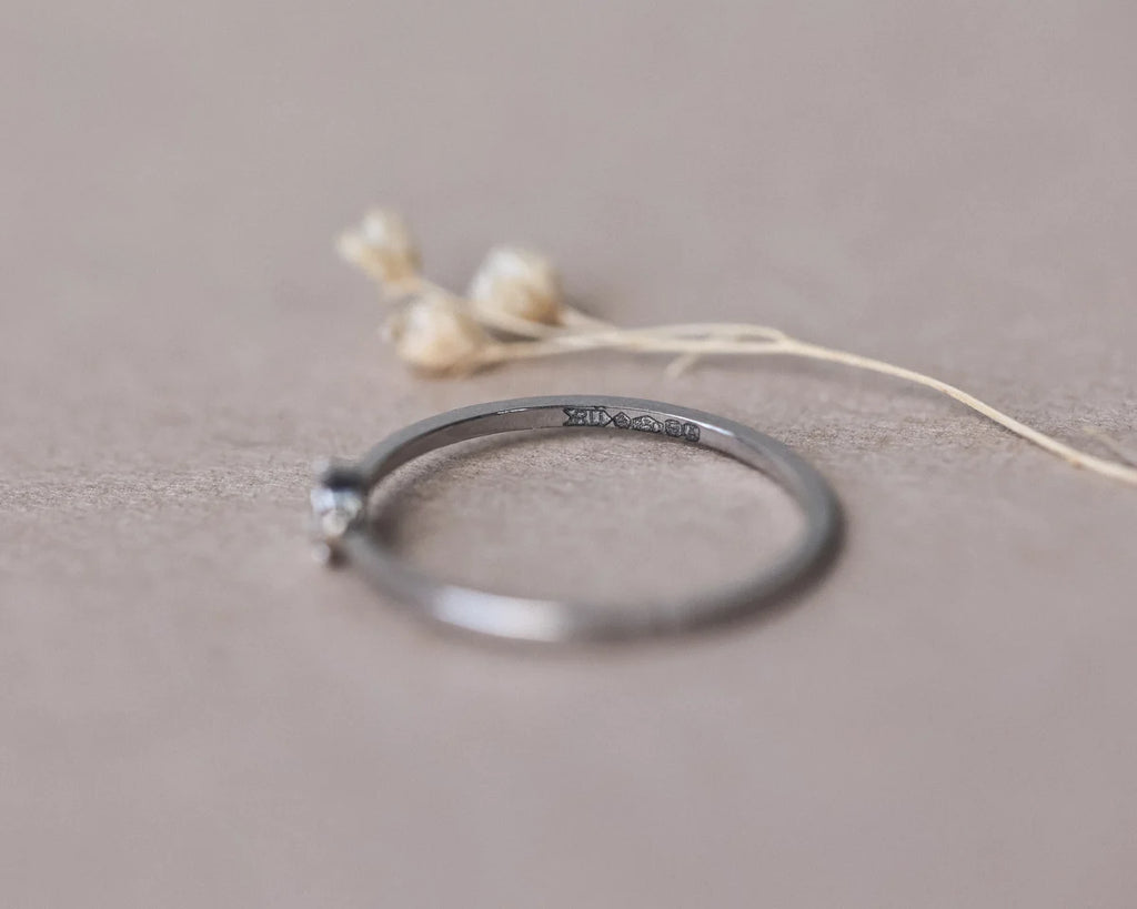 Low side profile of platinum rose-cut diamond ring