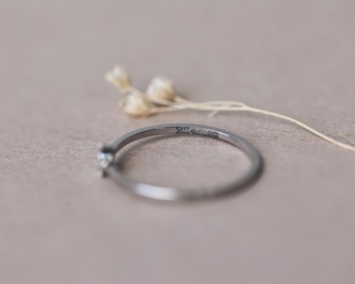 Low side profile of platinum rose-cut diamond ring