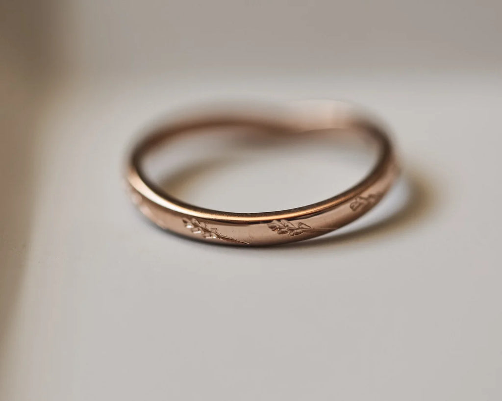 Low front view of handmade barleycorn wishbone ring in rose gold