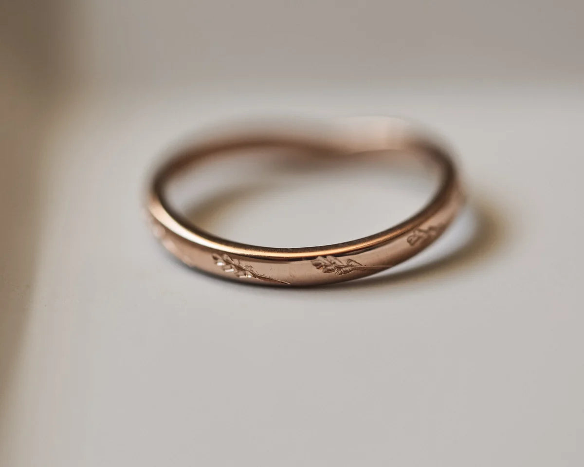Low front view of handmade barleycorn wishbone ring in rose gold