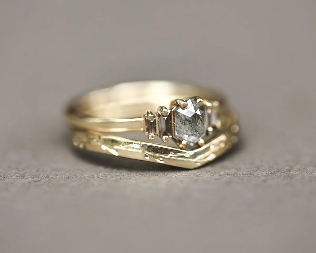 Pressed flower wishbone ring stacked with rose-cut diamond ring