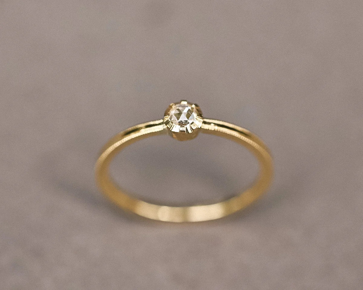 Handmade yellow gold rose-cut diamond ring shown from the front