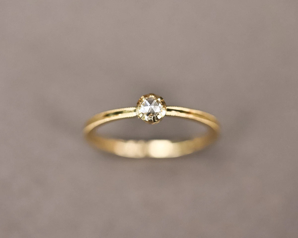 Front view of handmade yellow gold rose-cut diamond ring