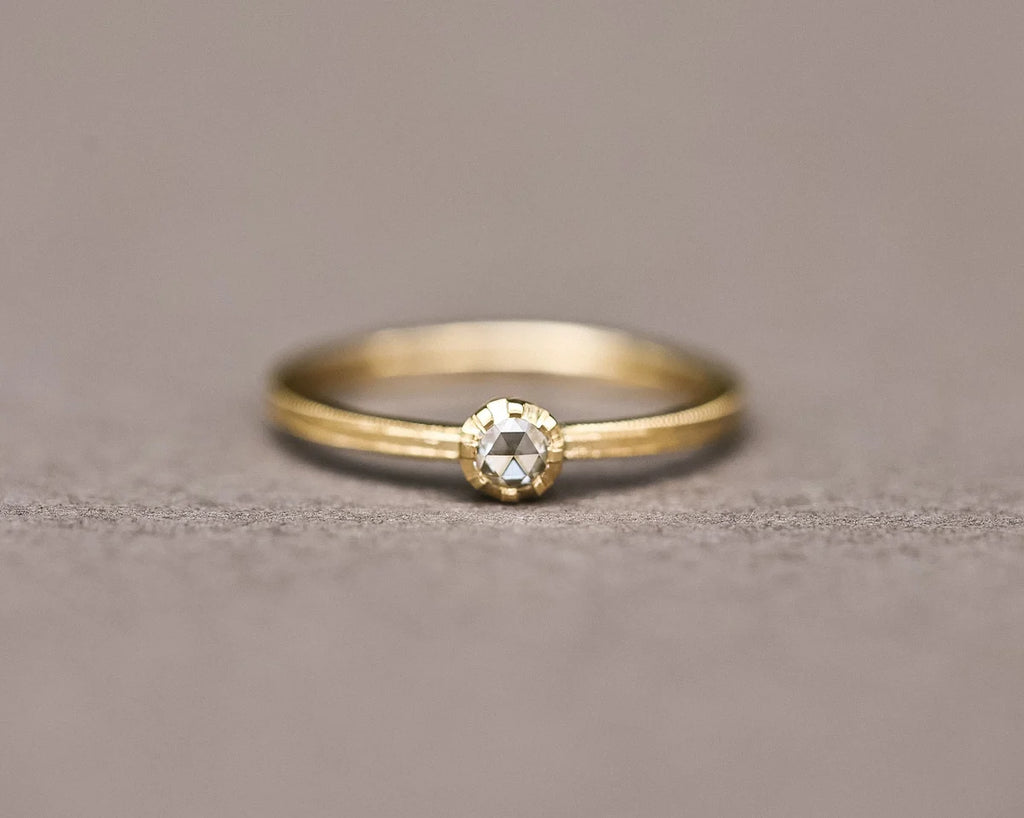 Low front view of rose-cut diamond ring in 18ct yellow gold
