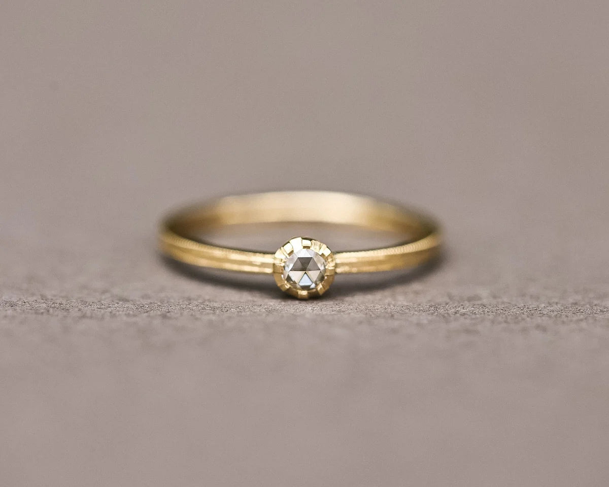 Low front view of rose-cut diamond ring in 18ct yellow gold