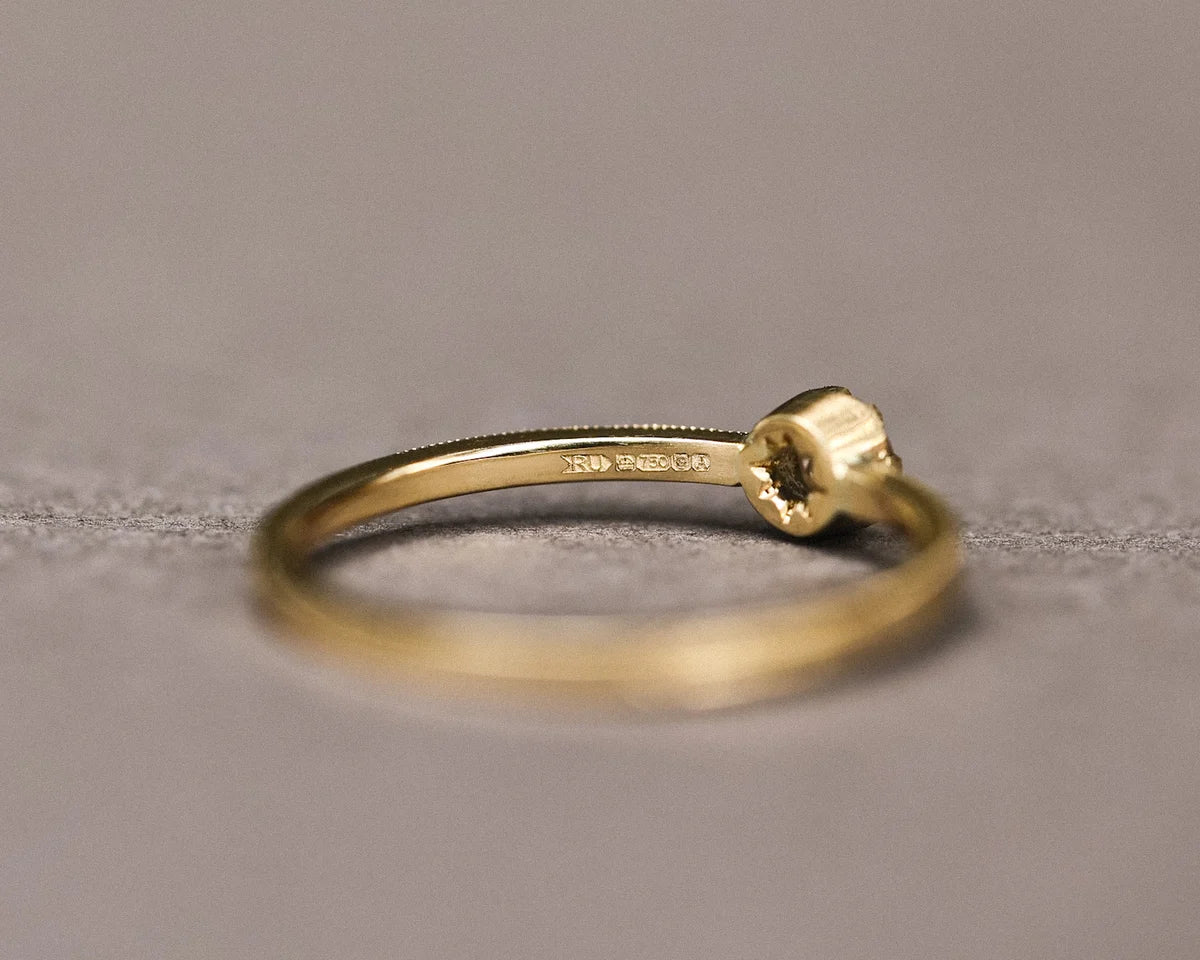 Side profile of 18ct yellow gold ring with 3mm rose-cut diamond