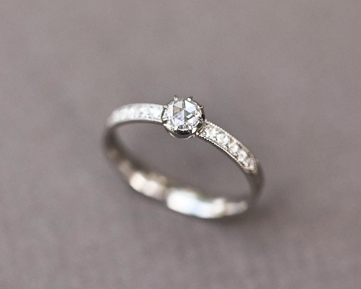 Handmade platinum rose-cut diamond pavé ring with cut-down setting