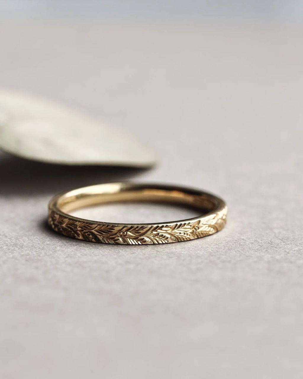 slim gold band laurel leaf engraving simple design