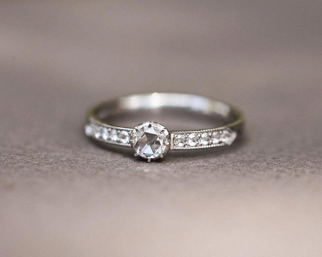 Platinum engagement ring with rose-cut centre diamond