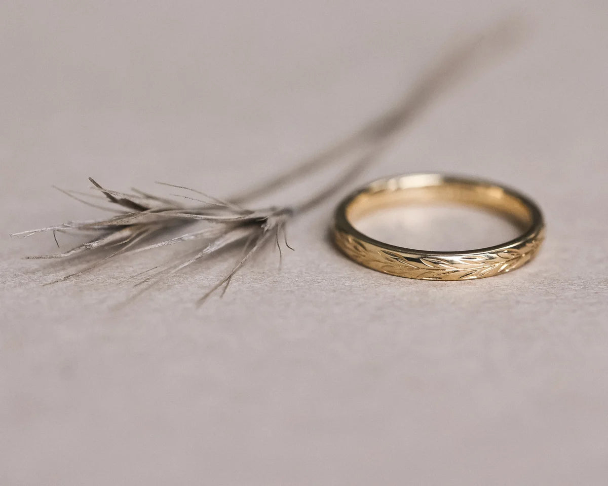 Minimal 2.5mm olive leaf wedding ring in 18ct yellow gold