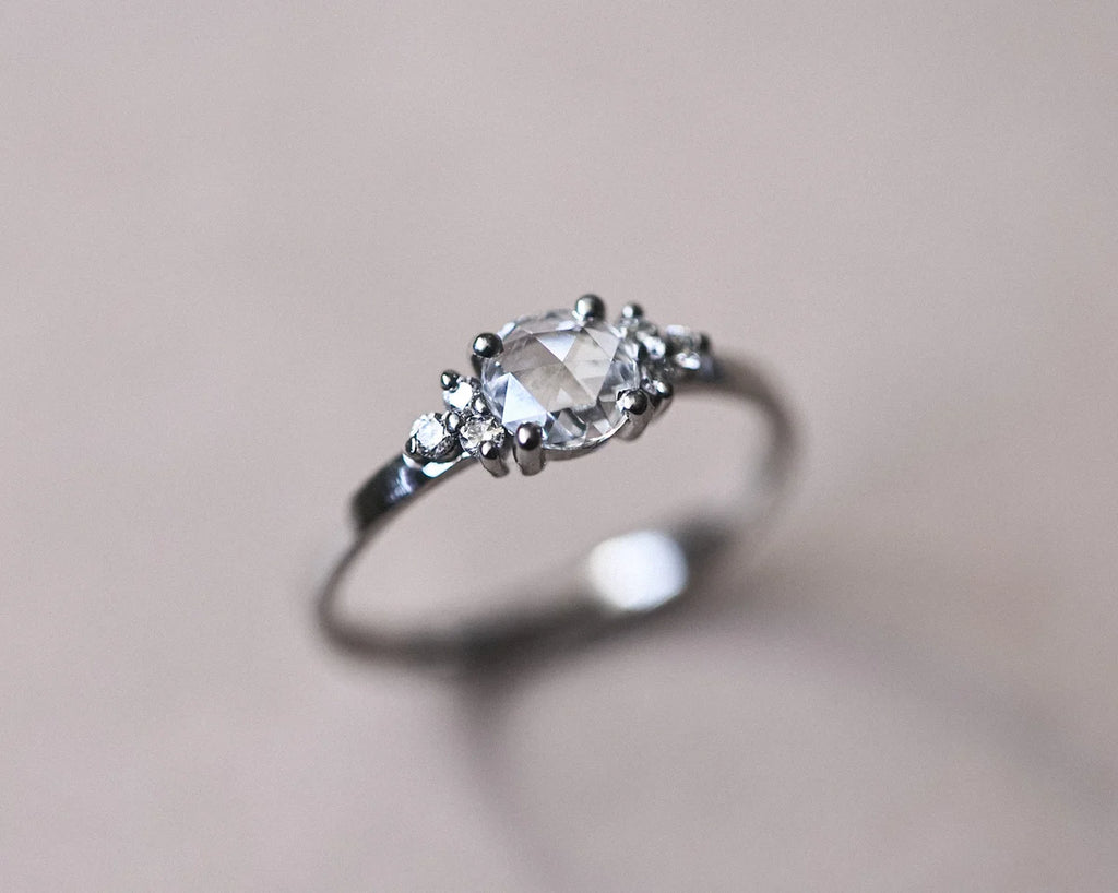 Platinum rose-cut diamond ring with six brilliant-cut diamond shoulders