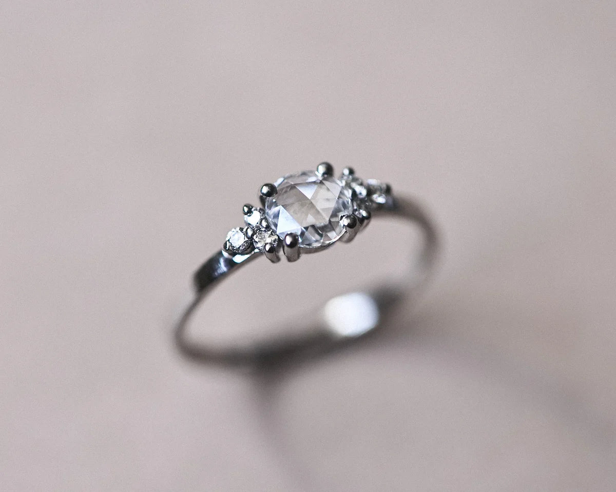 Platinum rose-cut diamond ring with six brilliant-cut diamond shoulders